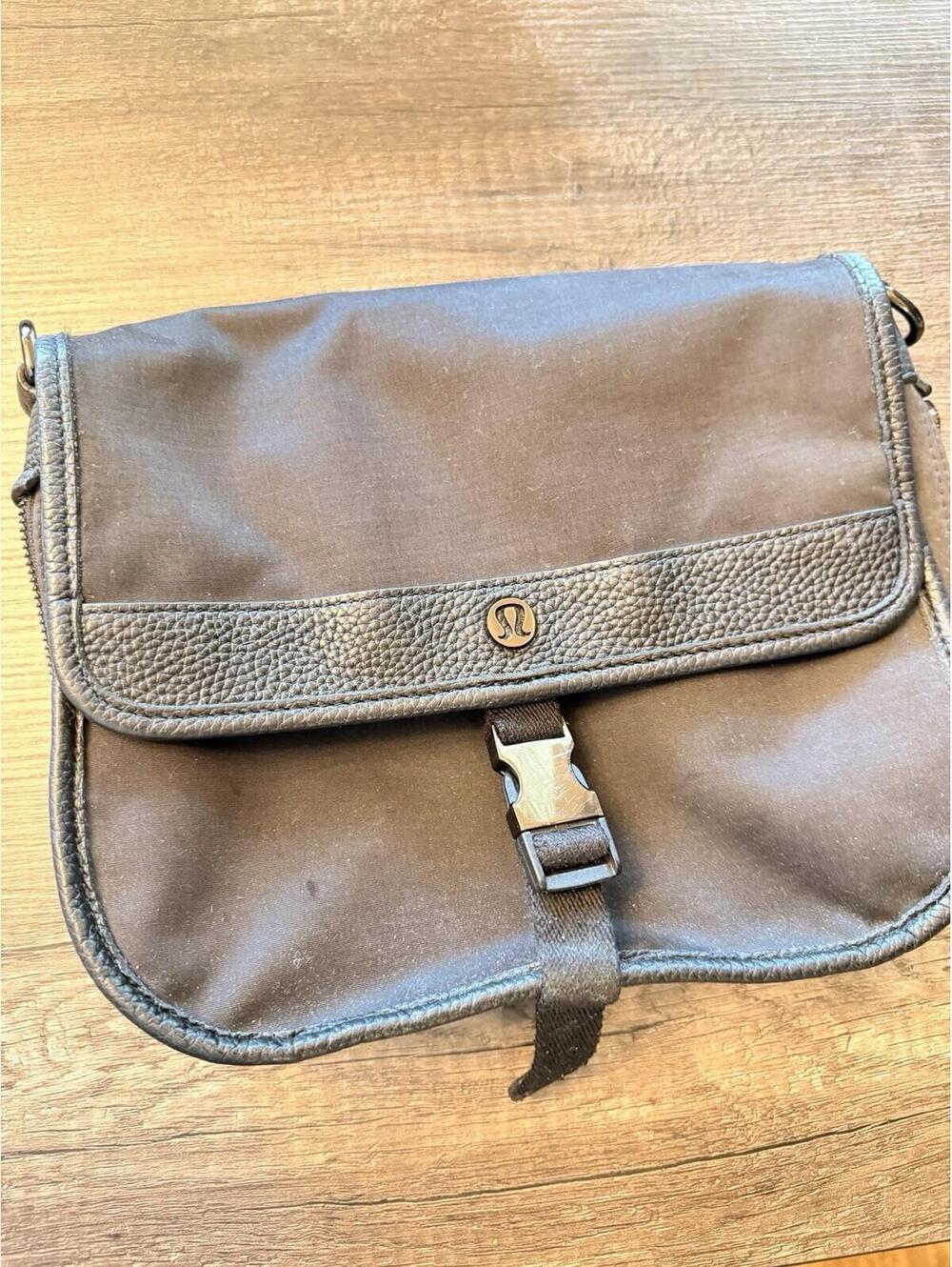 lululemon Black Messenger Bag  Buckle Closure Lined Zip Pocket